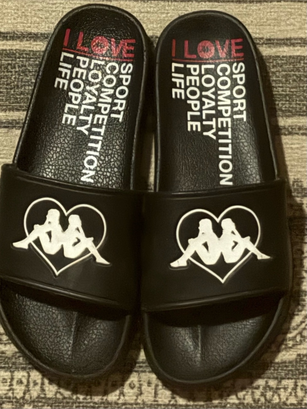 Kappa black slides with white heart logo EUC SZ.7.5 W SZ. 38